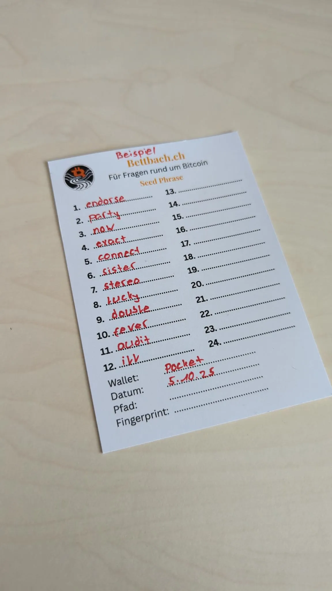 Seedphrase handschriftlich auf der Bettbach.ch Backupkarte